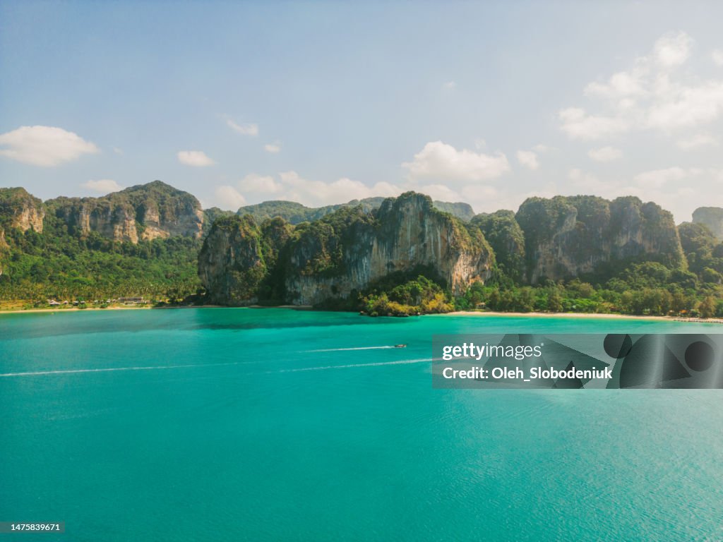 Aerial view of speedboats near an island in Andaman sea
