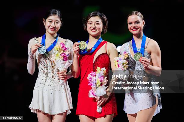 Haein Lee of Korea, Kaori Sakamoto of Japan and Loena Hendrickx of Belgium pose in the Women's medal ceremony during the ISU World Figure Skating...