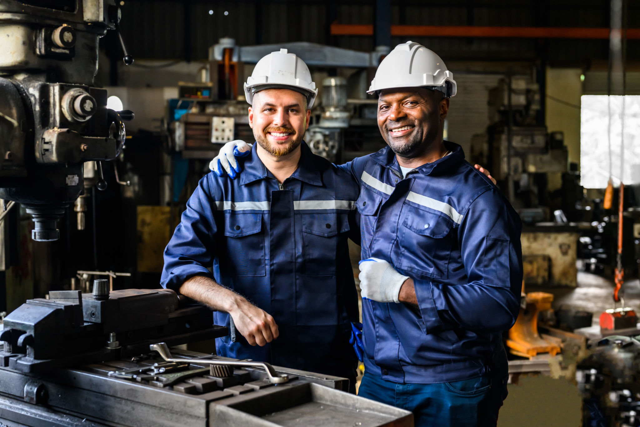 Portrait of professional mechanical engineer team checking and repairing engine Portrait of professional mechanical engineer team checking and repairing engine