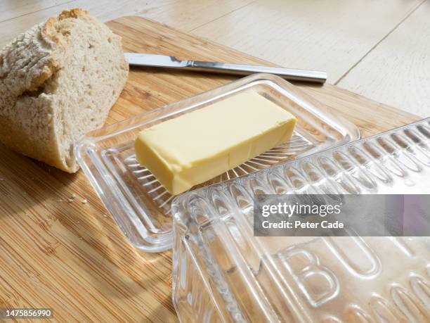 butter, butter dish and sourdough bread - butter dish stock pictures, royalty-free photos & images