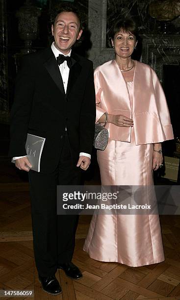 Anne Marie Raffarin and Stephane Bern during 12th Annual Nuit International de l'Enfance Charity Gala at Chateau de Versailles in Paris, France.