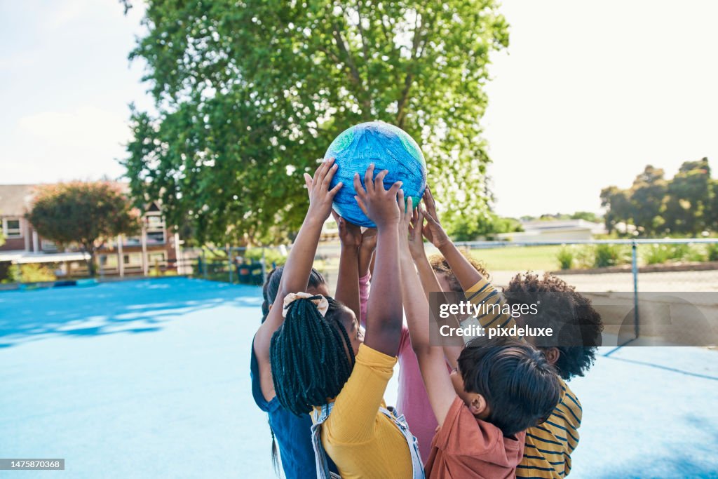 Sports, playing with ball and children on playground for fun, games and childhood activity together outdoors. Friendship, diversity and happy kids play sport for teamwork, support and relax in park