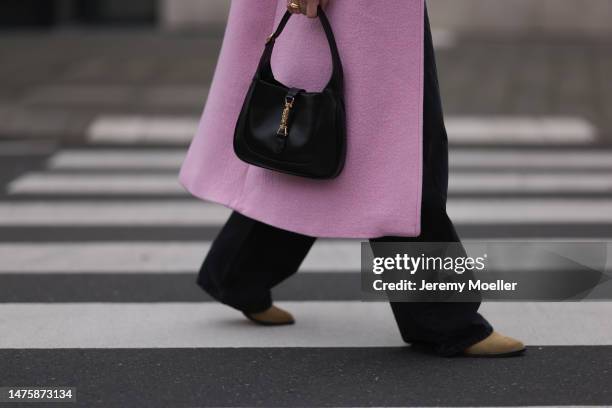 Karla Jenders seen wearing Zara pink long coat, Review black wide leg denim pants, Gucci Jackie 1961 black leather bag, Mango beige suede leather...