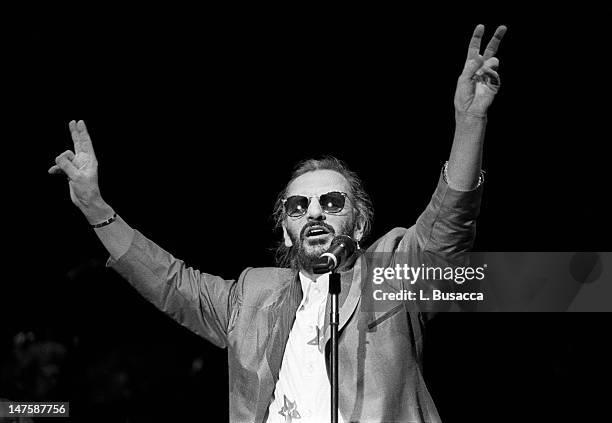 English musician Ringo Starr onstage during a concert, New York, New York, circa 1989.
