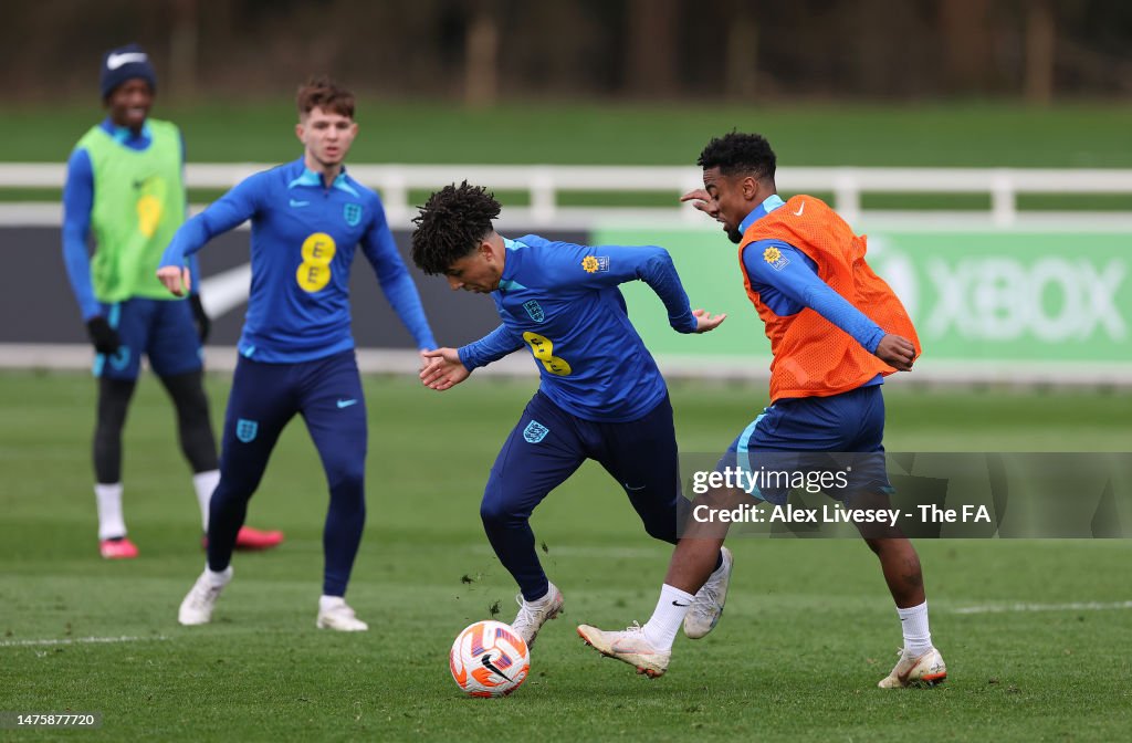 England Rico Rico Lewis of England is tackled by Angel Gomes during a England U21 ...