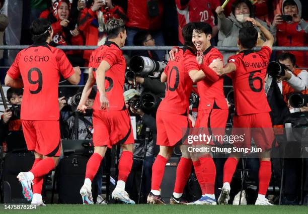 Son Heung-min of South Korea celebrates after scores teams first goal during the international friendly match between South Korea and Colombia at...