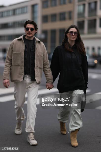 Mathis seen wearing Ray-Ban black sunglasses, Weekday grey cotton shirt, Weekday beige jacket, Weekday white denim pants. Karla Jenders seen wearing...