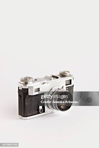 close-up of analogue photo camera against white background - アナログ ストックフォトと画像