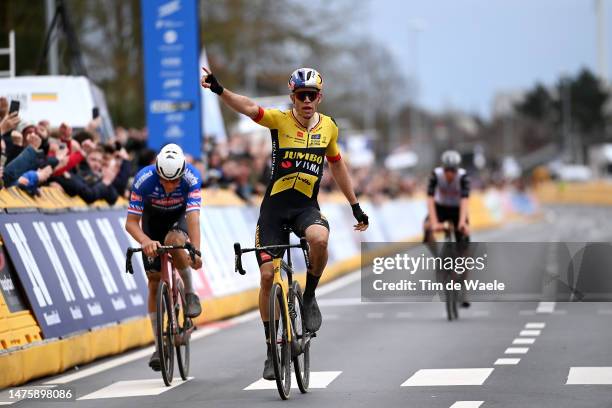 Wout Van Aert of Belgium and Team Jumbo-Visma celebrates at finish line as race winner ahead of Mathieu Van Der Poel of The Netherlands and Team...