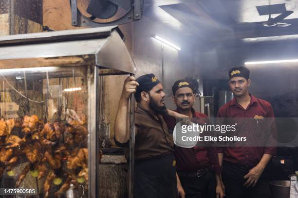 Restaurant workers prepare food after breaking fast in Old Delhi on March 24, 2023 in Delhi, India. India, which has a Muslim population of over 200...