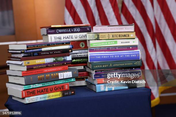 Copies of banned books from various states and school systems from around the county are seen during a press conference by U.S. House Democratic...