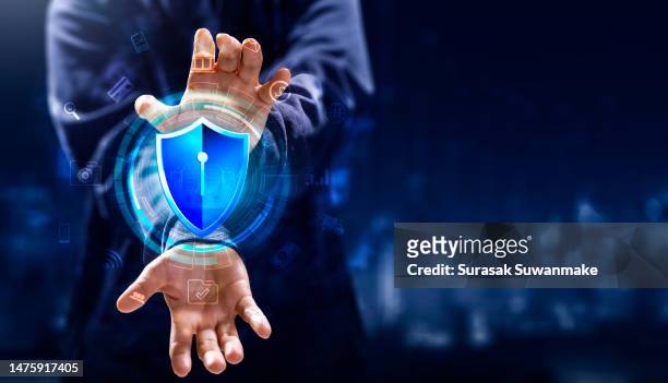 internet security key shield on blue background with digital data showing data security in cyberspace - schlüssel suchen stock-fotos und bilder