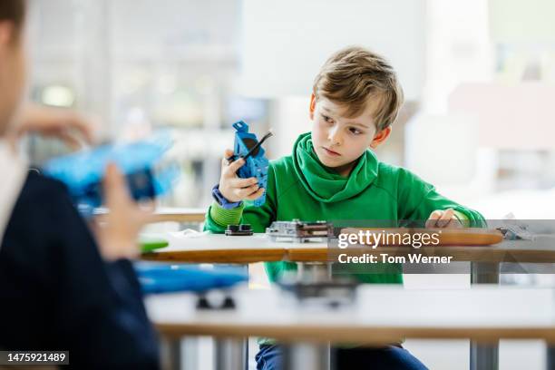 6,371 Kids Exploring Technology Stock Photos, High-Res Pictures, and ...