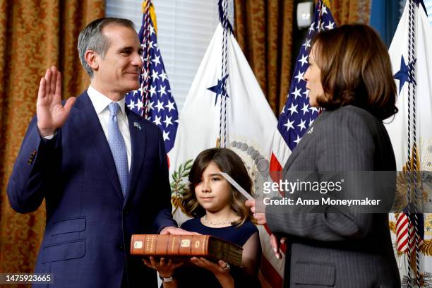 Vice President Kamala Harris ceremonially swears in Eric Garcetti as Ambassador to India alongside his daughter Maya Garcetti at the Eisenhower...