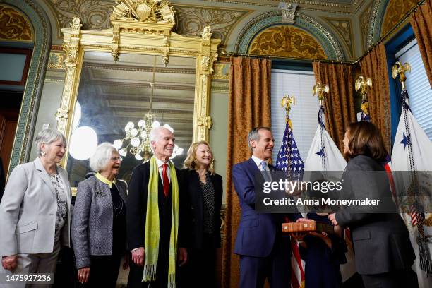 Vice President Kamala Harris shakes hands with Eric Garcetti after his swearing in ceremony as Ambassador to India at the Eisenhower Executive Office...