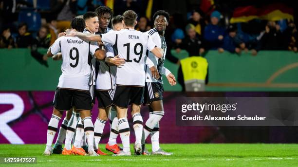 Denis Huseinbasic of Germany celebrates his side's second goal with his teammates during the Under-21 friendly match between Germany and Japan at PSD...