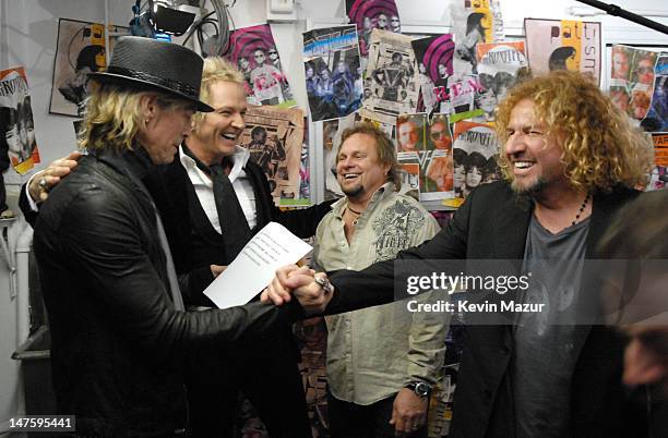 Duff McKagan and Matt Sorum of Velvet Revolver, presenters, with Michael Anthony and Sammy Hagar of Van Halen, inductees *EXCLUSIVE*