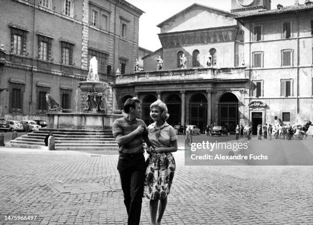 Actress Sandra Dee walking with actor Bobby Darin while in Rome in 1960.