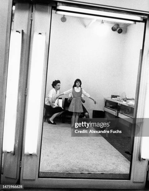 Actresses Mary Badham dressing up and dancing in front of a mirror for her role in the movie "To Kill A Mockingbird", in 1961 at Monroeville, Alabama.