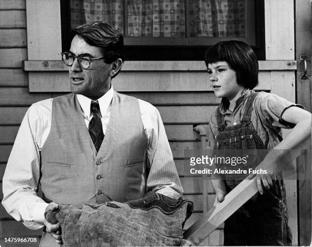 Actor Gregory Peck and actress Mary Badham in a scene of the film "To Kill A Mockingbird", in 1961 at Monroeville, Alabama.