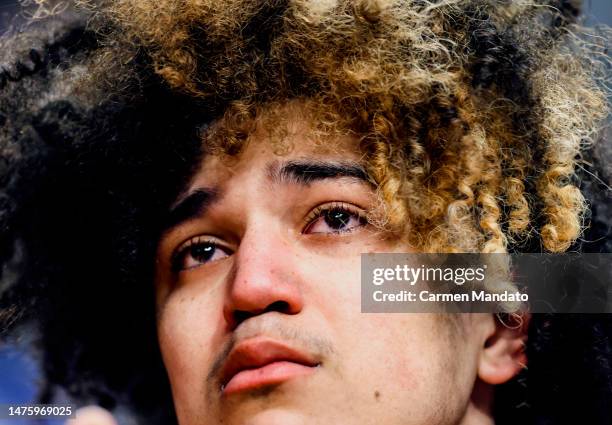 Anthony Black of the Arkansas Razorbacks reacts on the bench after coming out of the game during the second half against the Connecticut Huskies in...