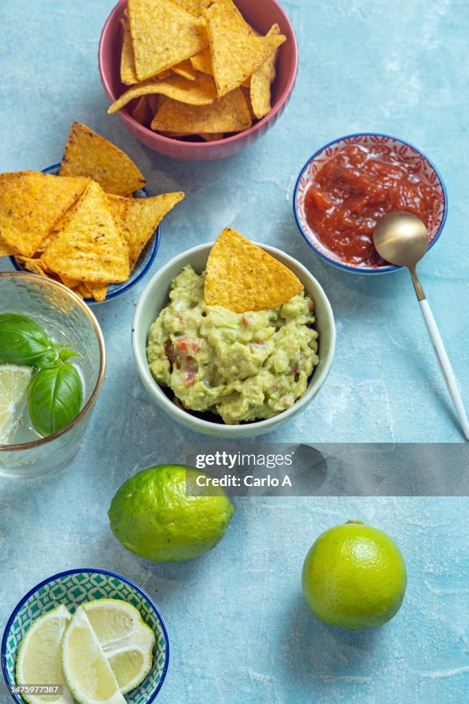 Guacamole and nachos in a bowl