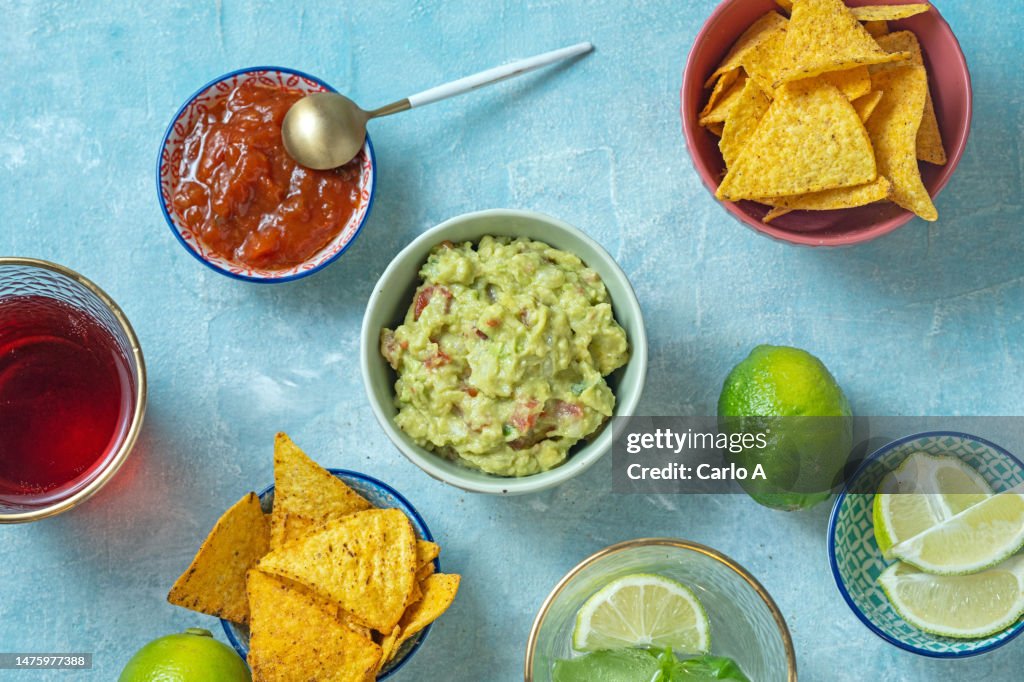 Guacamole and nachos in a bowl