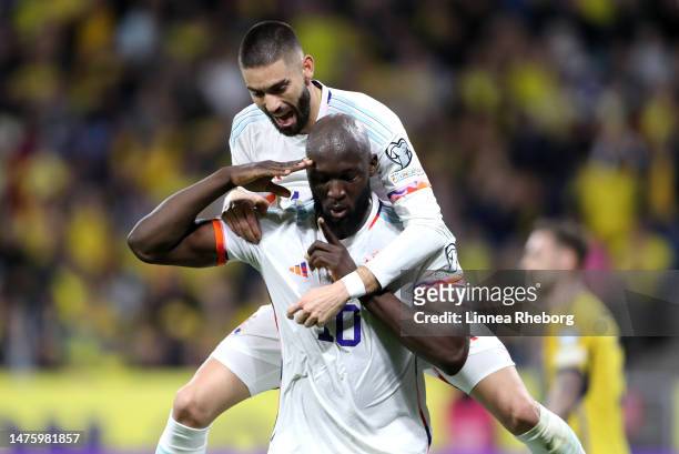 Romelu Lukaku of Belgium celebrates with teammate Yannick Carrasco after scoring the team's first goal during the UEFA EURO 2024 qualifying round...