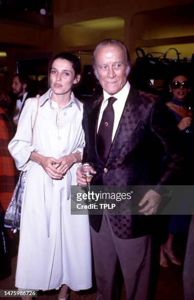 Canadian activist Margaret Trudeau and Italian personality and the chairman of Gucci from 1953 to 1986 Aldo Gucci pose for a portrait during an event...