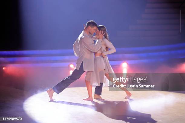 Michael „Mimi“ Kraus and Mariia Maksina dance on stage during the fifth "Let's Dance" show at MMC Studios on March 24, 2023 in Cologne, Germany.