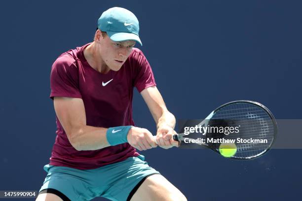 Jannik Sinner of Italy returns a shot to Laslo Djere of Serbia during the Miami Open at Hard Rock Stadium on March 24, 2023 in Miami Gardens, Florida.