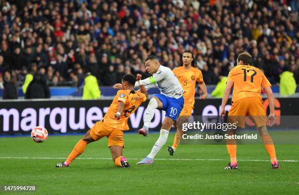 Kylian Mbappe of France scores the team's fourth goal past Jurrien Timber of Netherlands during the UEFA EURO 2024 qualifying round group B match...