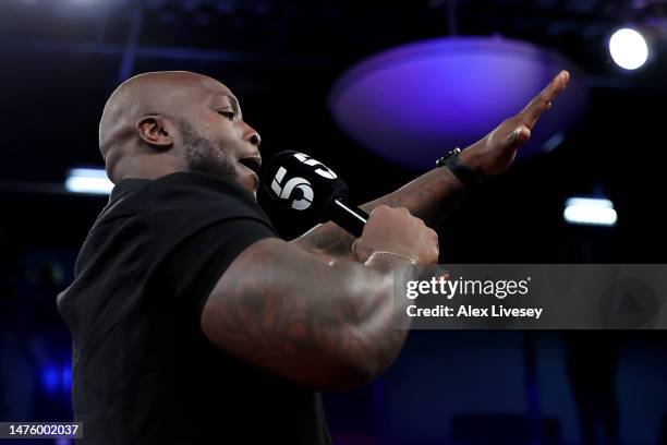 Former Footballer Adebayo Akinfenwa presents for Channel 5 prior to the Light Heavyweight Title fight between Lyndon Arthur and Boris Crighton at...