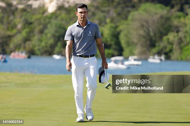 Billy Horschel of the United States walks across the 14th green after defeating Jon Rahm of Spain 5 & 4 during day three of the World Golf...