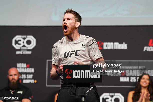 Cory Sandhagen poses on the scale during the UFC Fight Night ceremonial weigh-in at AT&T Center on March 24, 2023 in San Antonio, Texas.