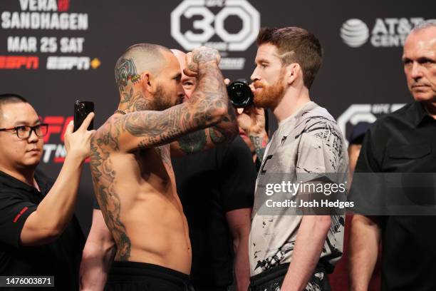 Marlon Vera of Ecuador and Cory Sandhagen face off during the UFC Fight Night ceremonial weigh-in at AT&T Center on March 24, 2023 in San Antonio,...