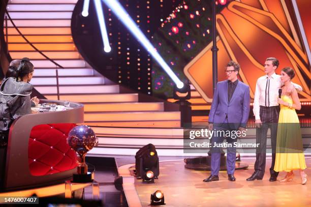 Judges Jorge Gonzalez, Motsi Mabuse and Joachim Llambi, host Daniel Hartwich and contestants Timon Krause and Ekaterina Leonova are seen on stage...