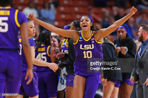 Angel Reese of the LSU Lady Tigers celebrates after the LSU Lady Tigers beat the Utah Utes 66-63 in the Sweet 16 round of the NCAA Women's Basketball...