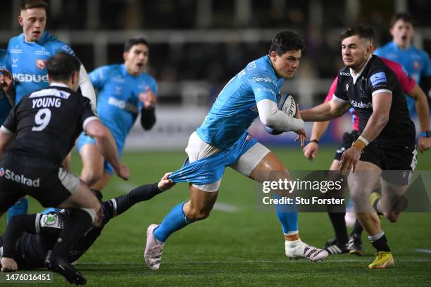 Gloucester wing Louis Rees-Zammit breaks the tackle of Falcons wing Mateo Carreras during the Gallagher Premiership Rugby match between Newcastle...