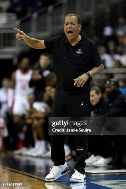 Head coach Kelvin Sampson of the Houston Cougars calls out a play against the Miami Hurricanes during the first half in the Sweet 16 round of the...