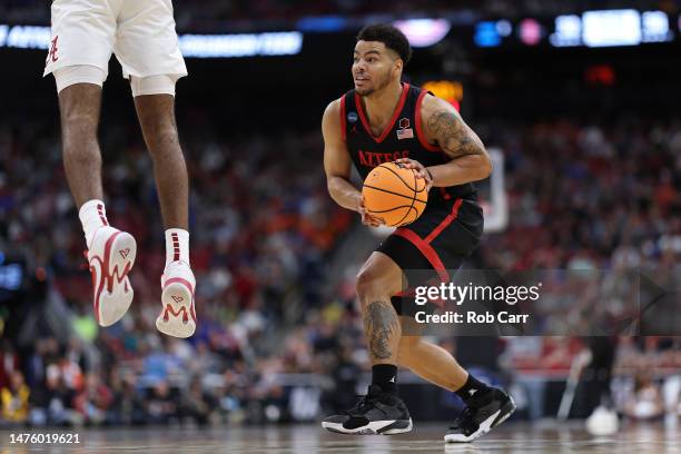 Matt Bradley of the San Diego State Aztecs drives against the Alabama Crimson Tide during the second half in the Sweet 16 round of the NCAA Men's...