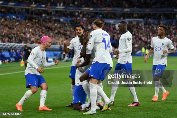 Dayot Upamecano of France celebrates with teammates after scoring the team's second goal during the UEFA EURO 2024 qualifying round group B match...