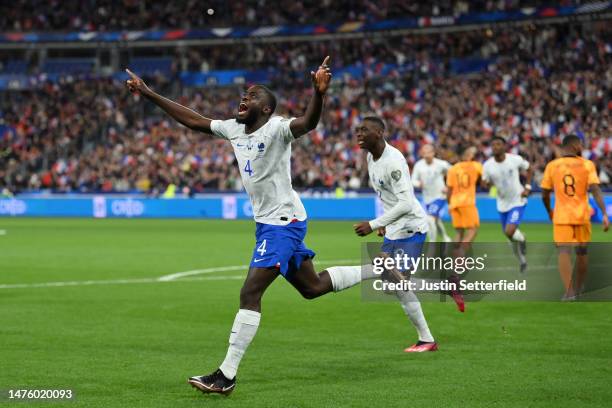 Dayot Upamecano of France celebrates after scoring the team's second goal during the UEFA EURO 2024 qualifying round group B match between France and...