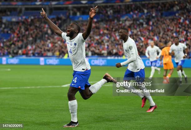 Dayot Upamecano of France celebrates after scoring the team's second goal during the UEFA EURO 2024 qualifying round group B match between France and...