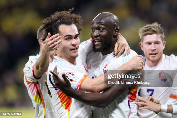 Romelu Lukaku of Belgium celebrates with teammate Arthur Theate of Belgium after scoring the team's first goal during the UEFA EURO 2024 qualifying...