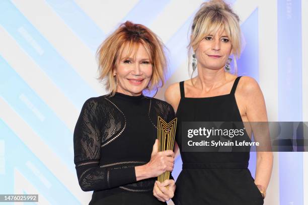Best actress award winner Clementine Celarie and a guest are seen during the closing ceremony during the Series Mania Festival 2023 on March 24, 2023...
