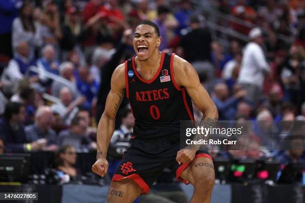 Keshad Johnson of the San Diego State Aztecs celebrates after defeating Alabama Crimson Tide, 71-64, during the second half in the Sweet 16 round of...