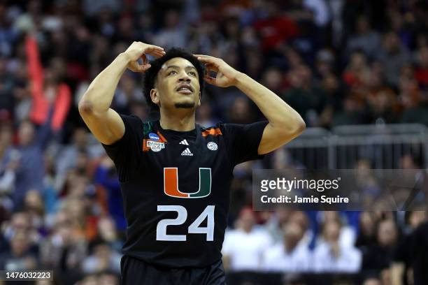 Nijel Pack of the Miami Hurricanes celebrates after a three-point basket against the Houston Cougars during the second half in the Sweet 16 round of...