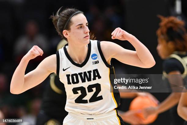 Caitlin Clark of the Iowa Hawkeyes reacts during the fourth quarter of the game against the Colorado Buffaloes in the Sweet 16 round of the NCAA...