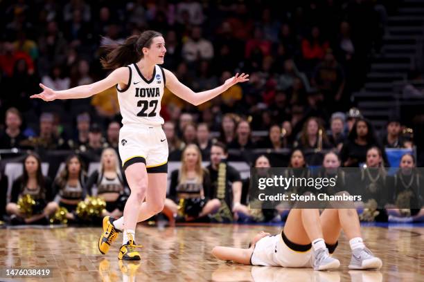 Caitlin Clark of the Iowa Hawkeyes reacts during the fourth quarter of the game against the Colorado Buffaloes in the Sweet 16 round of the NCAA...